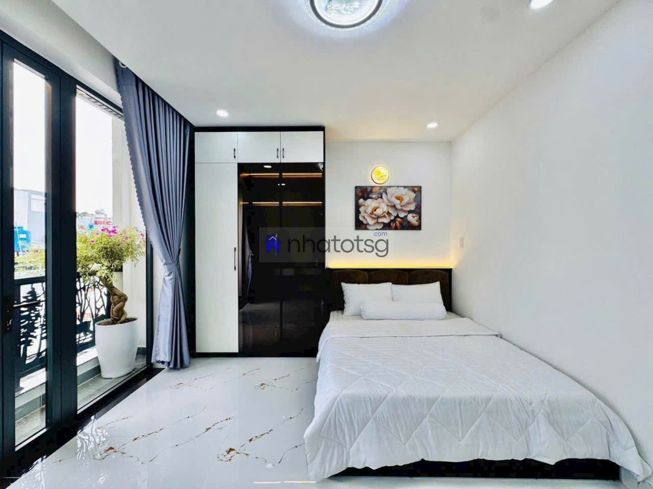 Bán nhà đường Quang Trung Gò Vấp có sân thượng 6.39T