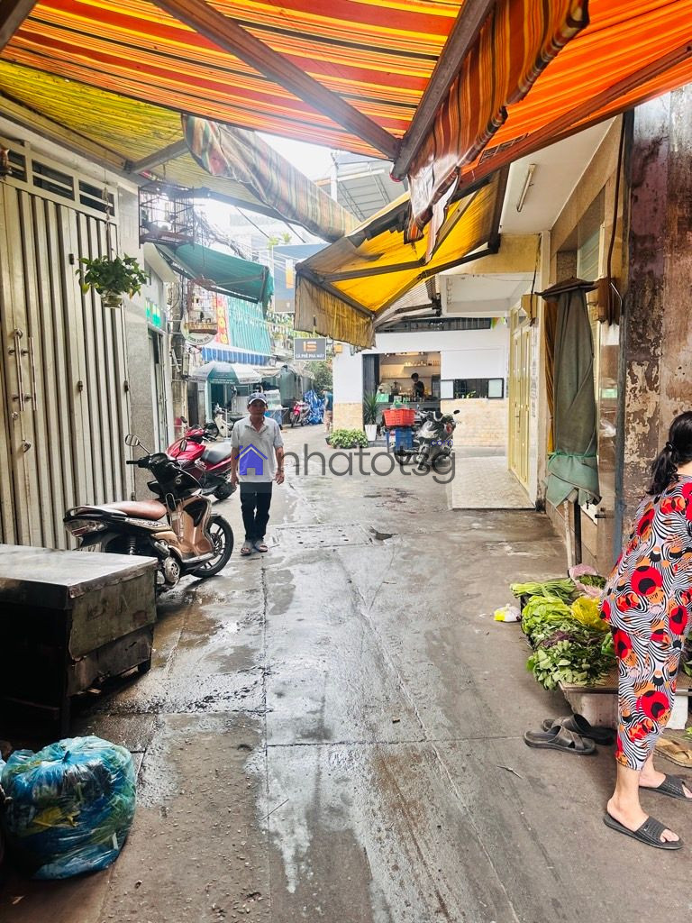 MẶT TIỀN CHỢ XÓM THUỐC - 2 TẦNG - CHỦ ĐANG KINH DOANH BUÔN BÁN.