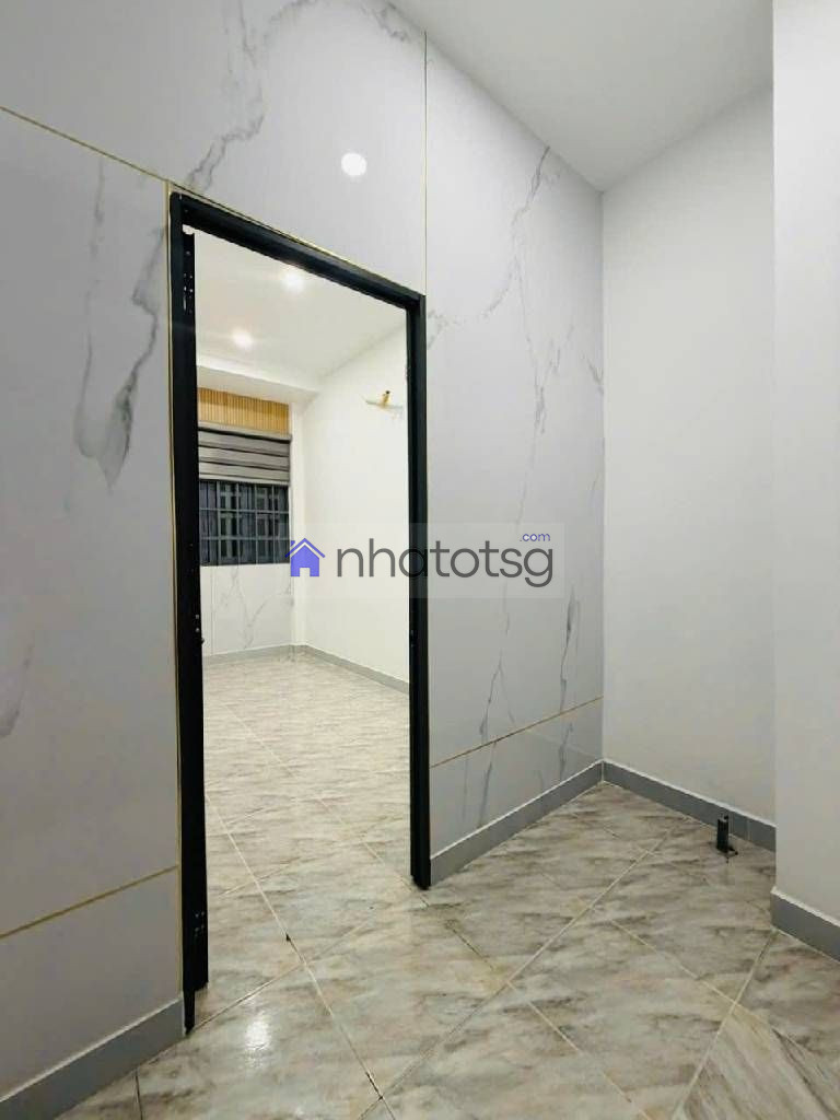 MẶT TIỀN - NHÀ 2 TẦNG XE HƠI NGỦ TRONG NHÀ