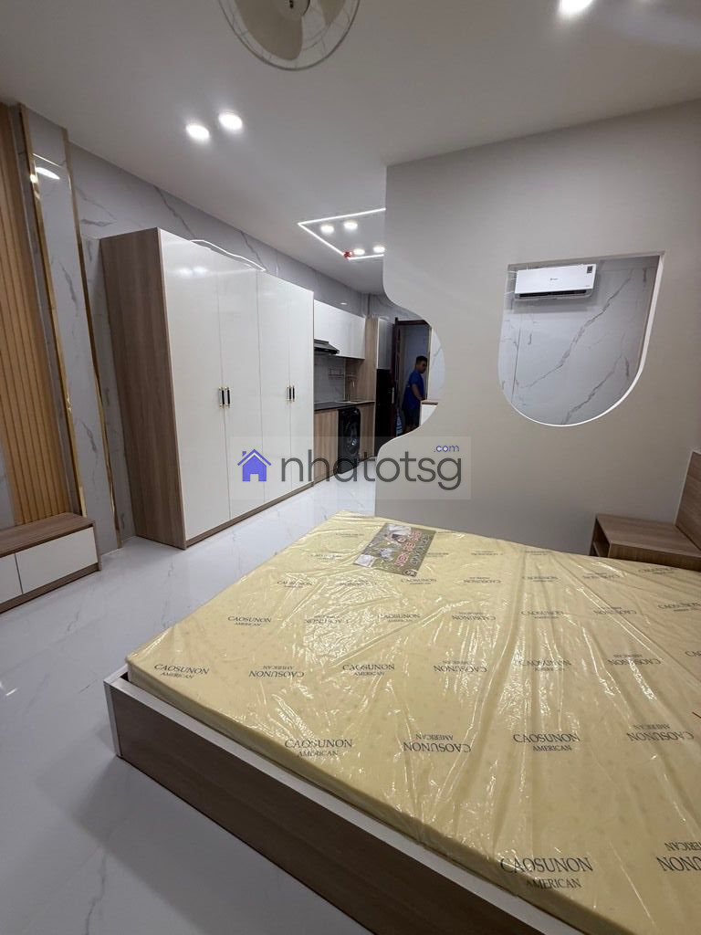 CĂN HỘ DỊCH VỤ 4 TẦNG - XE HƠI NGỦ TRONG NHÀ.