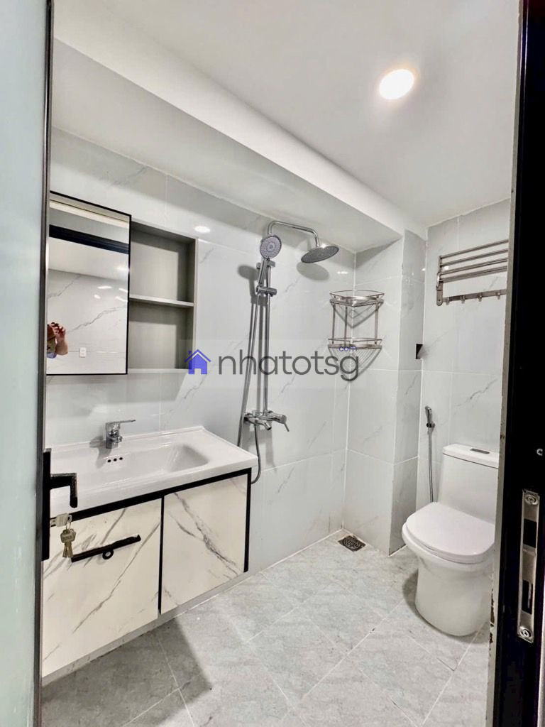 CĂN HỘ DỊCH VỤ 4 TẦNG - XE HƠI NGỦ TRONG NHÀ.