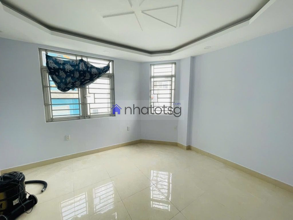 GÓC 2 MẶT TIỀN  - 5 TẦNG KIÊN CỐ.  HẺM Ô TÔ 7 CHỖ VÀO THOẢI MÁI.